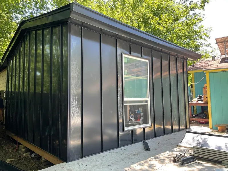 Black standing seam metal wall panels for Roof Inspection in Buffalo