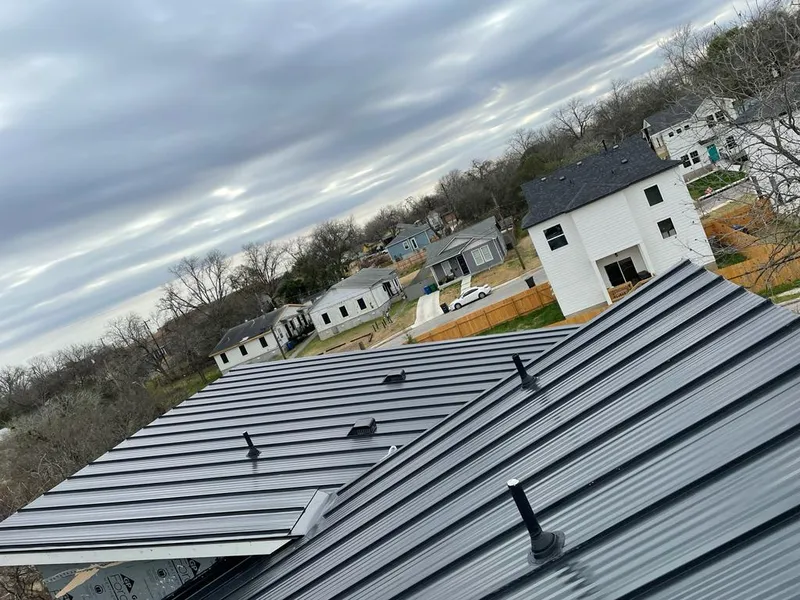 Standing seam metal roof panels with vents for Skylight Repair in Buffalo